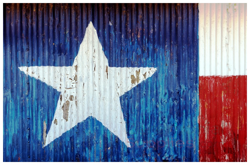 Faded red, white and blue Texas state flag painted on surface.