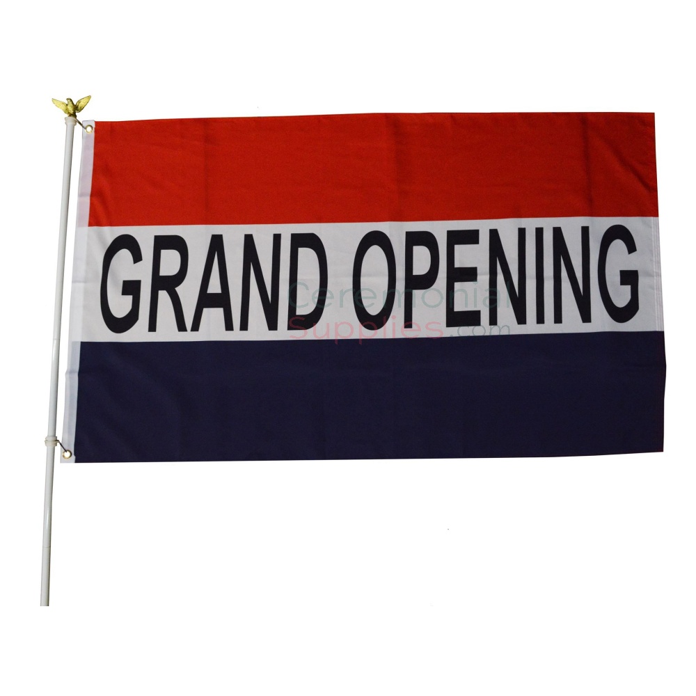 grand opening red white and blue sign