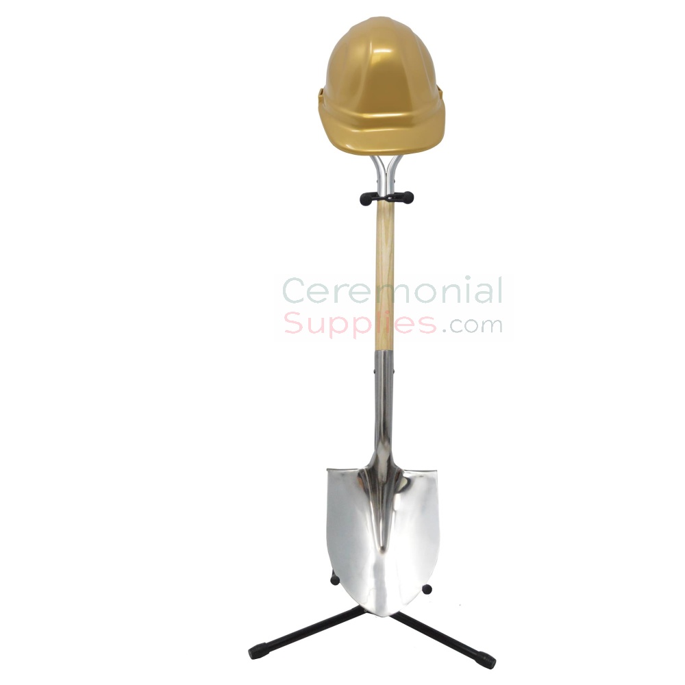 shovel on a stand with hard hat