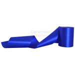 Royal blue wide ribbon in creative pose.