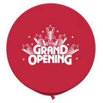 Giant inflated red grand opening balloon.