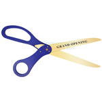 Image of golden scissors displaying grand opening text.