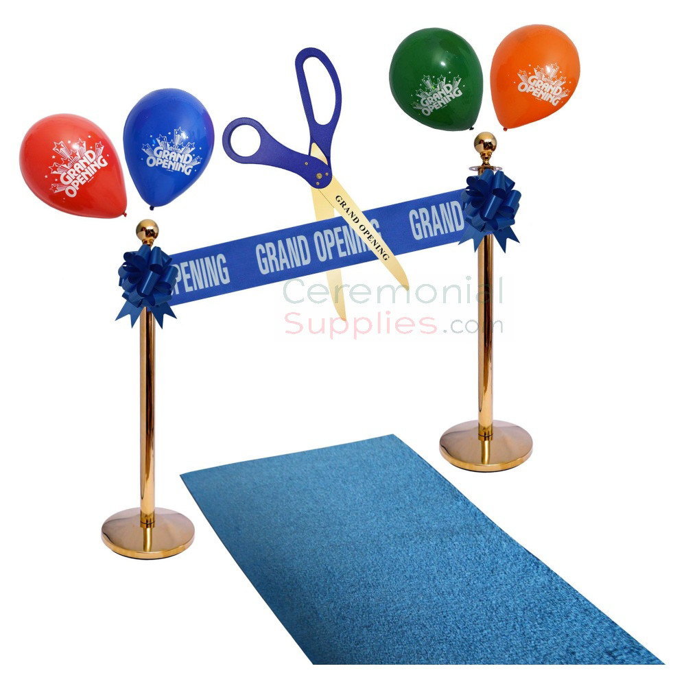 grand opening sign with stanchion posts and balloons