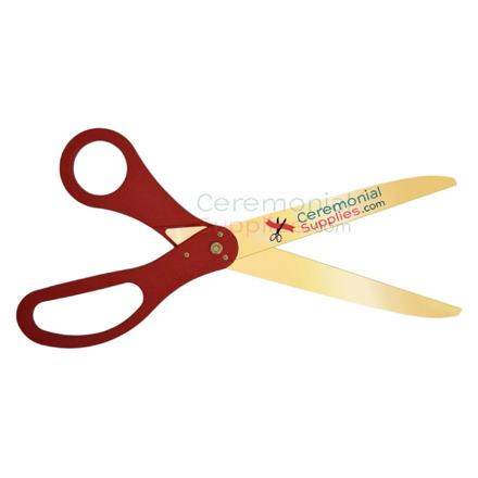 Picture of red customizable giant scissors with golden blades.