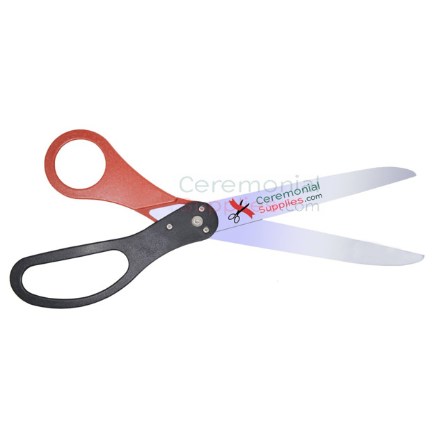 Picture of custom two-tone ribbon cutting scissors in red and black in open position.