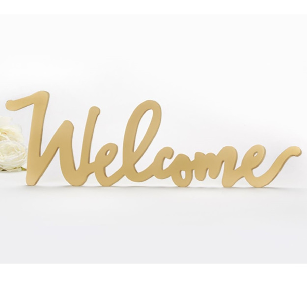 Picture of a Golden Welcome Wedding Sign.