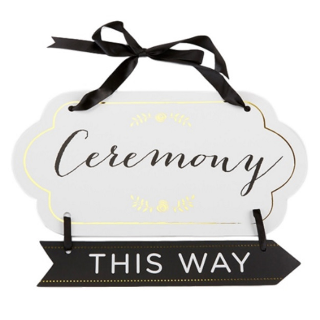 Photo of a Gold Accented Ceremony Guide Sign pointing right.