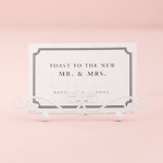 Photo of a Mini White Stationery Holder with a card.