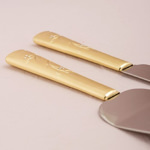 Close up view of a Golden Serving Set.