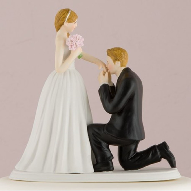 Image of a light tone On One Knee Bride and Groom Cake Topper.