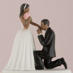 Picture of a dark tone On One Knee Bride and Groom Cake Topper.