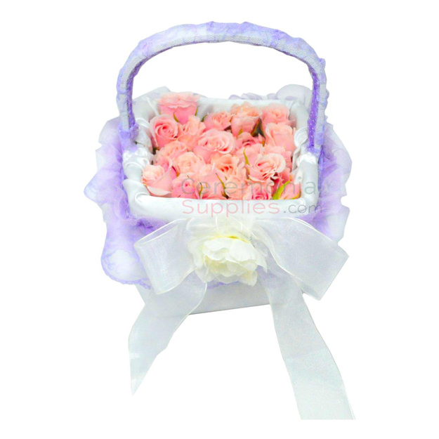 Wedding Flower Girl Basket with flower petals.