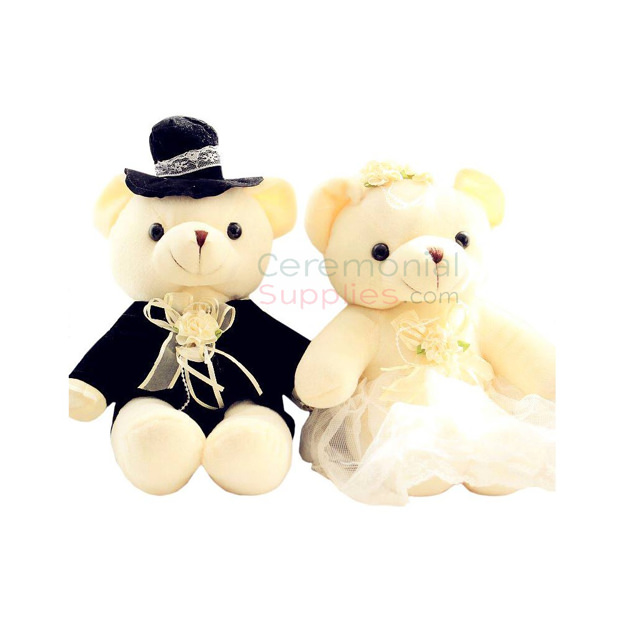 Photo of two bears dressed as the Wedding couple, the Bride and Groom.