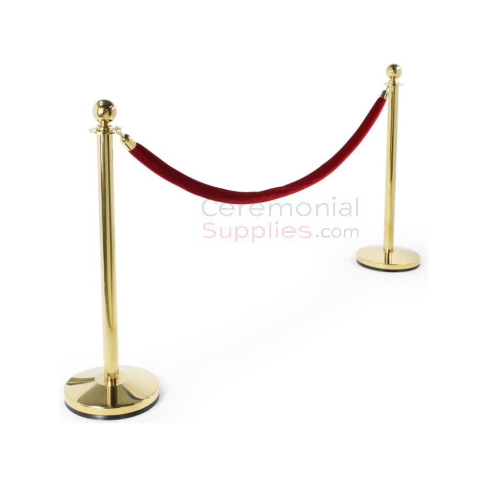gold stanchions and red velvet rope