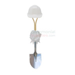 Image of white groundbreaking shovel and white hard hat and bow kit.