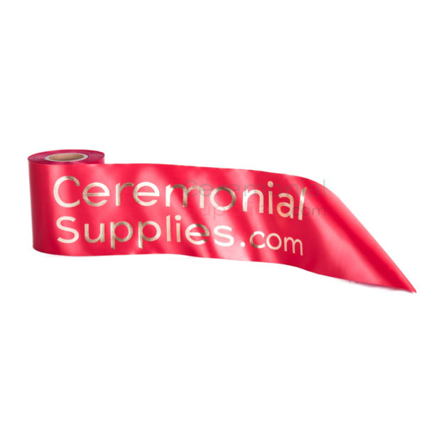 red ceremonial ribbon with gold printing