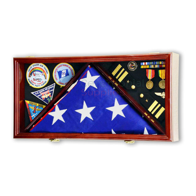 Large rectangle case sectioned off in three rectangles two holding medals and one holding an American flag