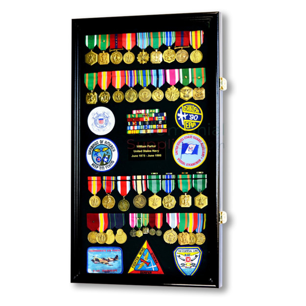Large vertical display case filled with medals