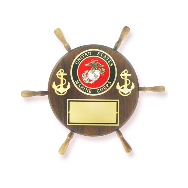Ship wheel shaped wooden plaque with the US Marine emblem and two anchors, and a plate to engrave below