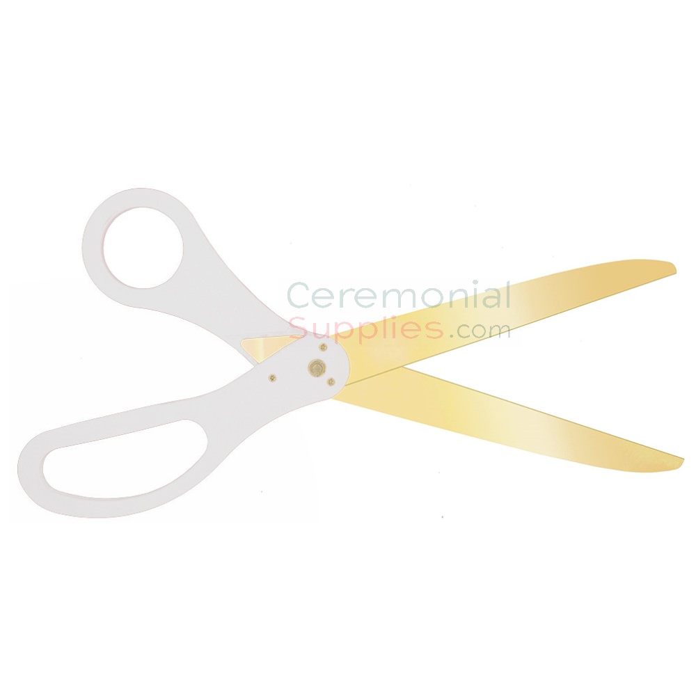 Hand Holding Golden Pair of Ribbon Scissors Isolated on White Ba