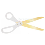 Image of golden blade scissors with white handles.