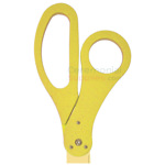 Close-up of yellow handles on custom golden blade scissors.