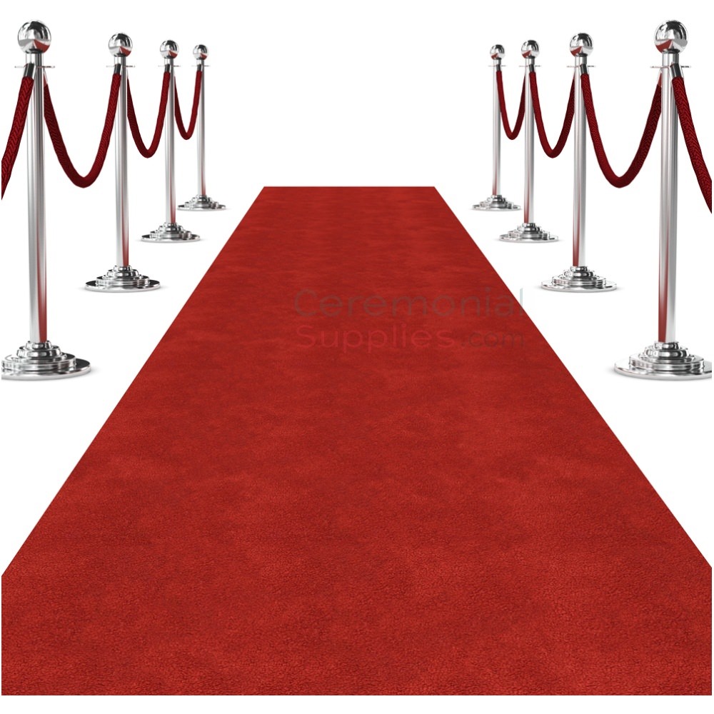 red carpet runner flanked by silver stanchions crowd posts and red velvet rope