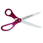 Image of ceremonial scissors with custom logo sample and maroon handles.