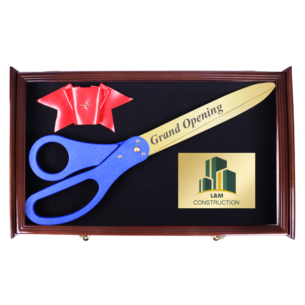 giant ribbon-cutting scissors in display case