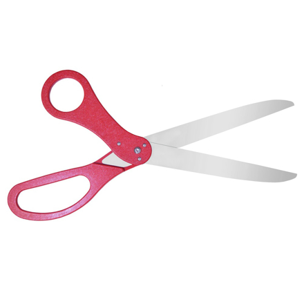 Red ribbon cutting scissors in open blade pose.