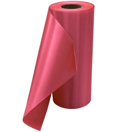 Rolled up view of hot pink plain grand opening ribbon. Rolled up view of hot pink plain grand opening ribbon.