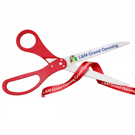 Red ribbon cutting scissors with design